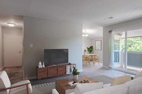 a living room with a couch and a television