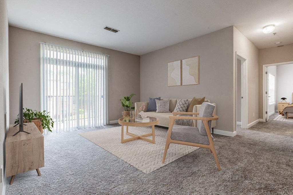 a living room with a couch and a table