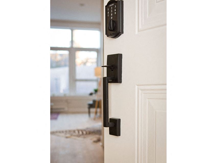 the door is open and the door handle is black