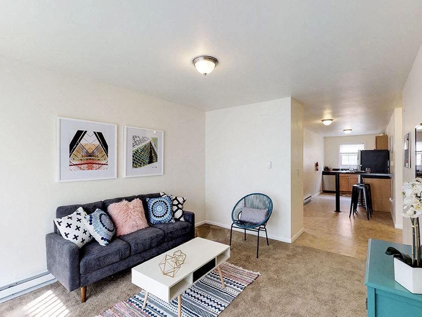 a living room with a couch and a coffee table