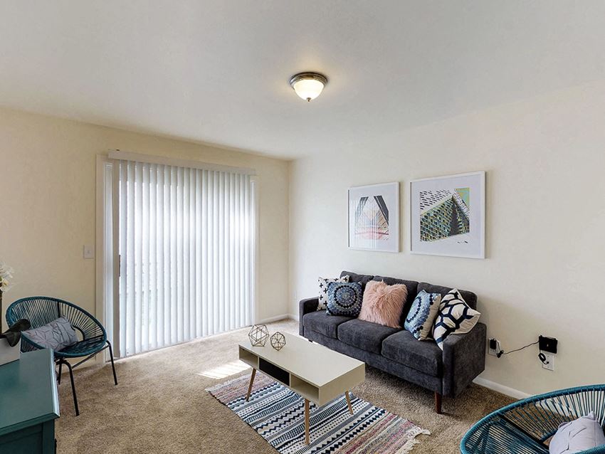 a living room with a couch and a table