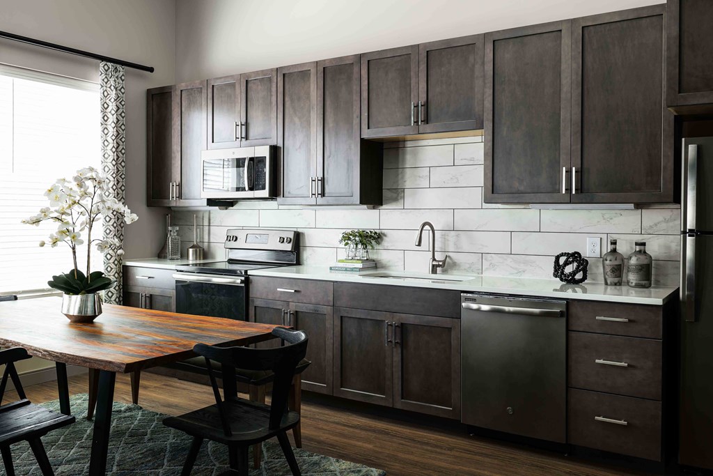 Upton Oxmoor Apartments Louisville modern kitchen with custom cabinetry