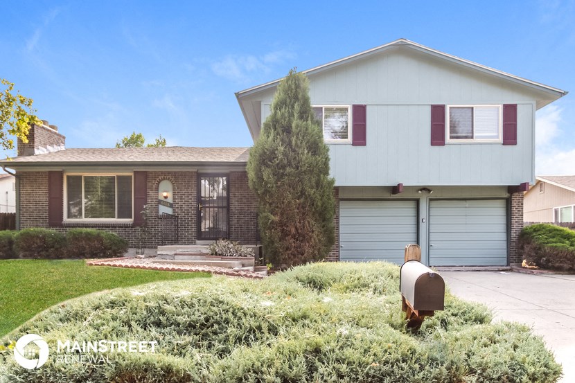 a house with a mailbox in front of it