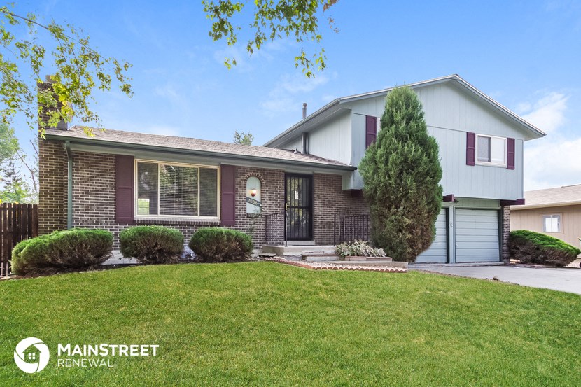 a house with a lawn in front of it