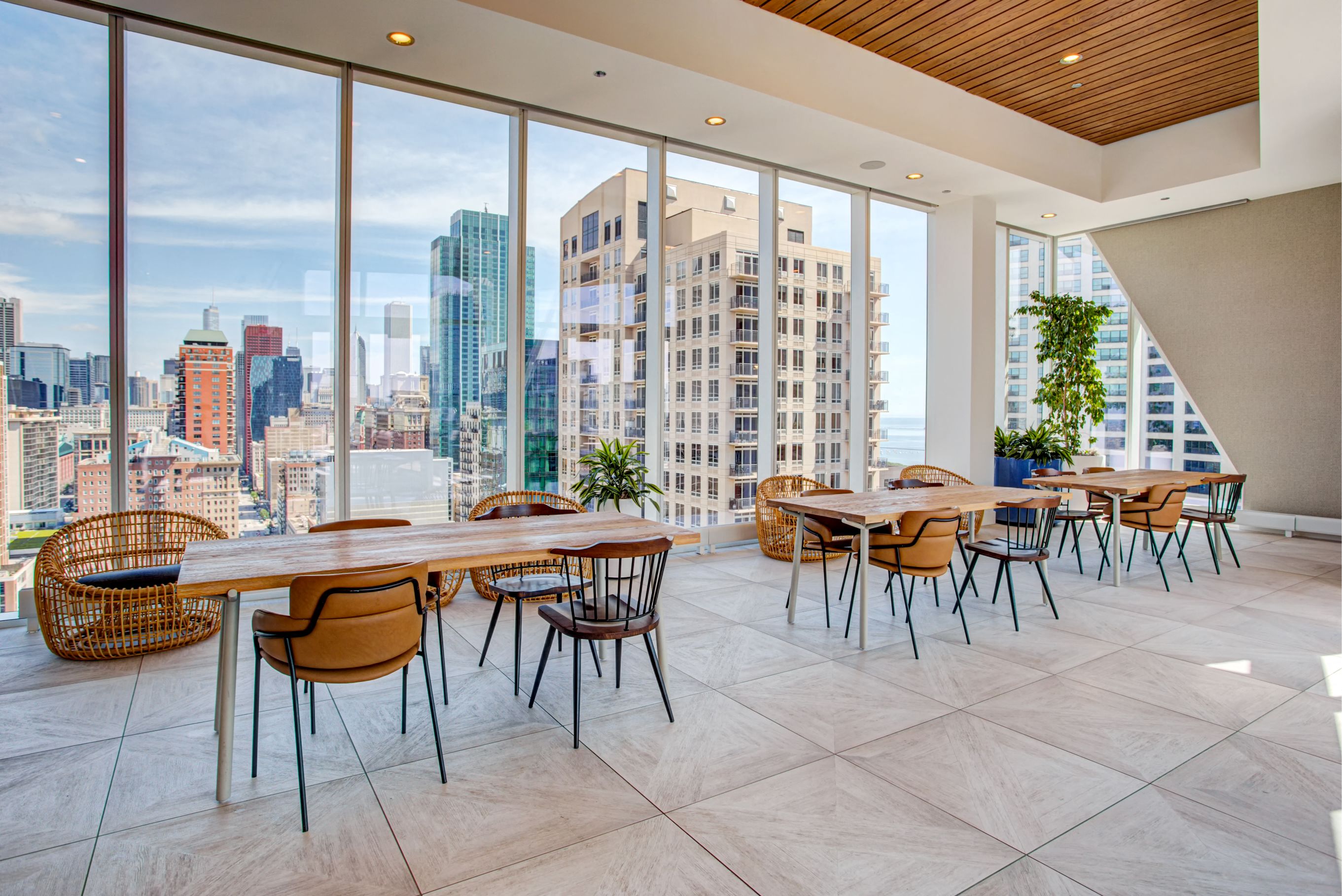 Indoor lounge with tables & chairs at Eleven40, Illinois, 60605