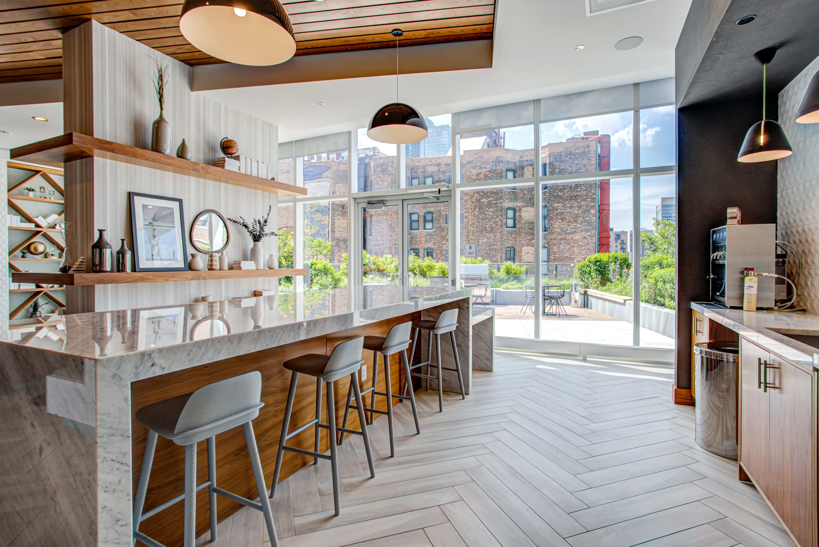 High top seating in the coffee lounge with brew station at Eleven40, Illinois