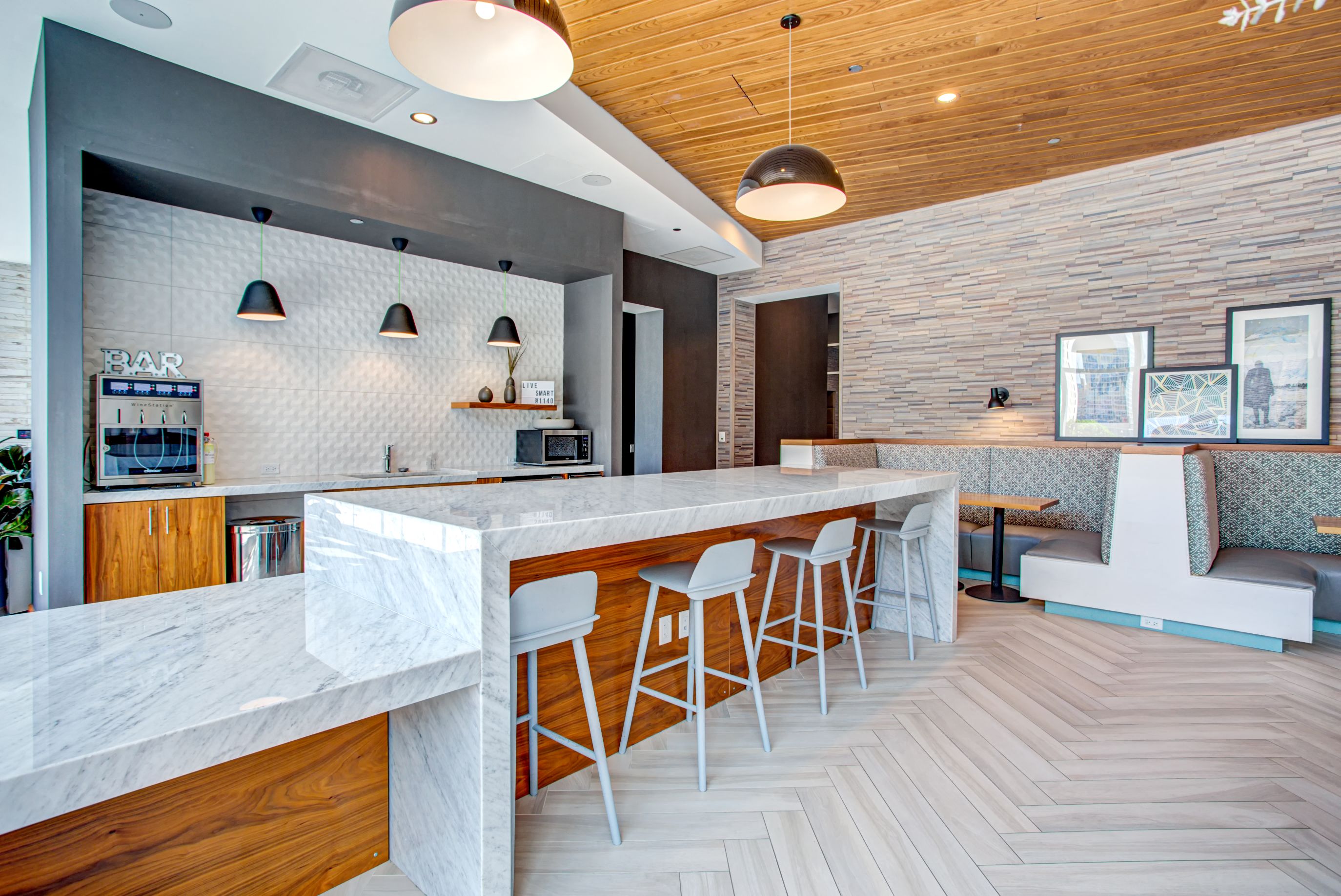 Coffee lounge co-working space with abundant bar style seating at Eleven40, Chicago, IL