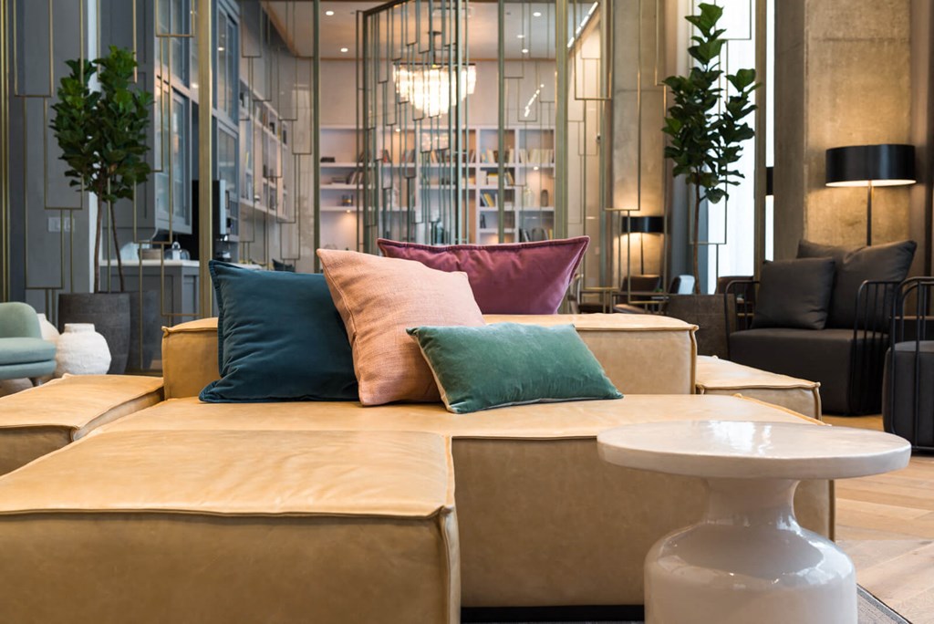 a couch with colorful pillows in a living room