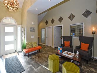 a living room with a couch and a table