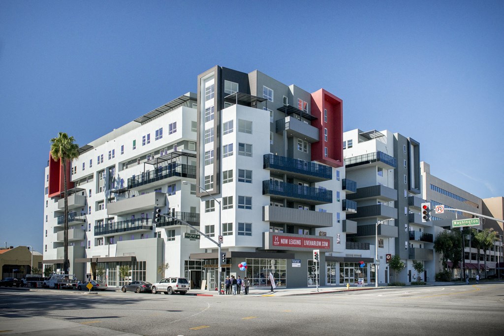 a tall building with a street in front of it