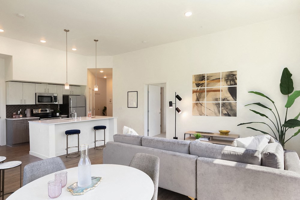 a living room with a couch and a table