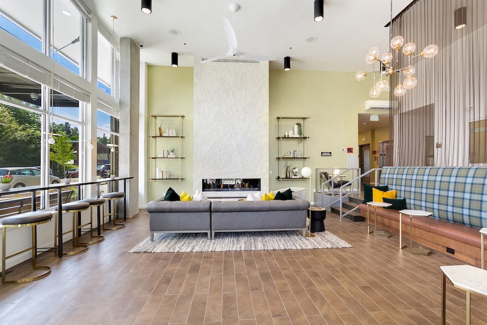 a living room with a couch and a fireplace