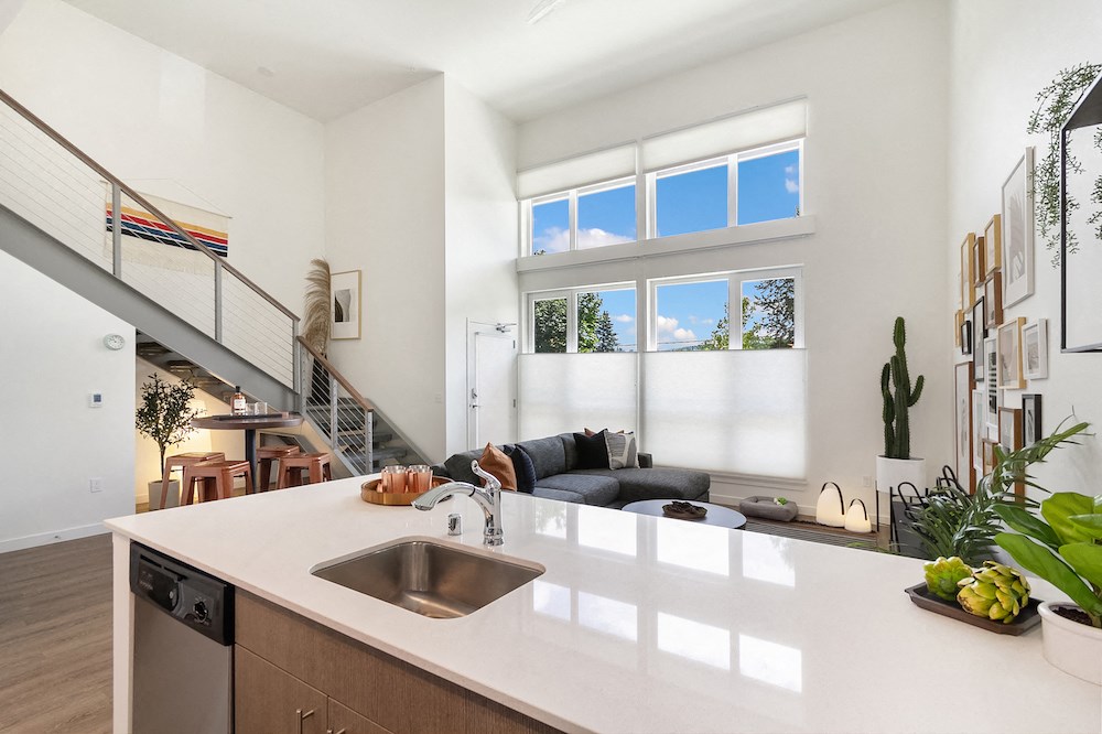 a kitchen with a counter top and a sink