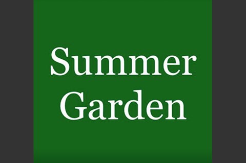 A green sign with the words "Summer Garden" written on it.