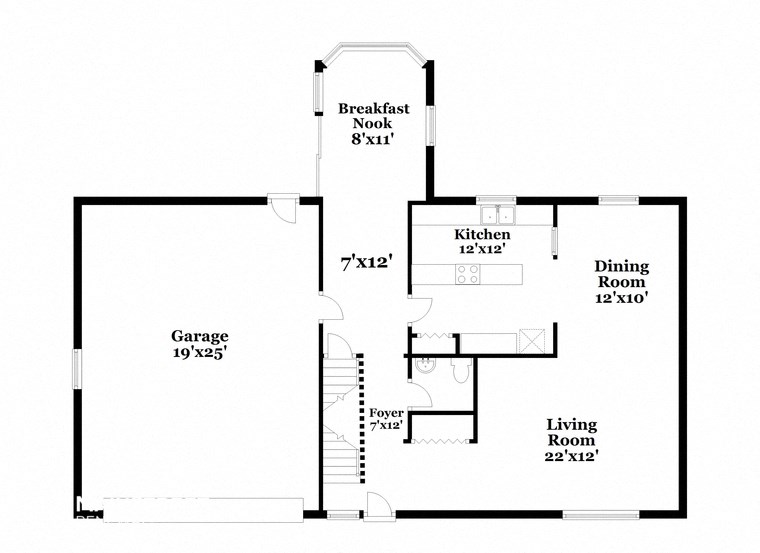 a floor plan of a house with a garage and a kitchen and a living room