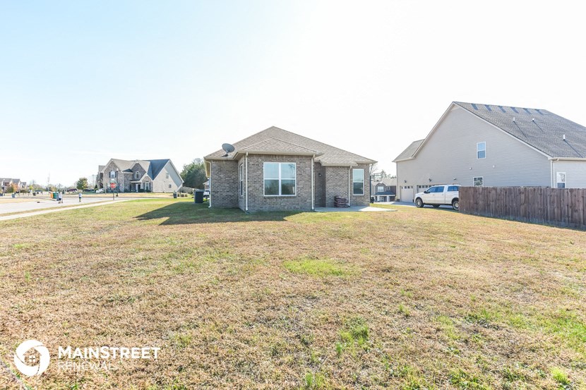 a house with a yard in front of it