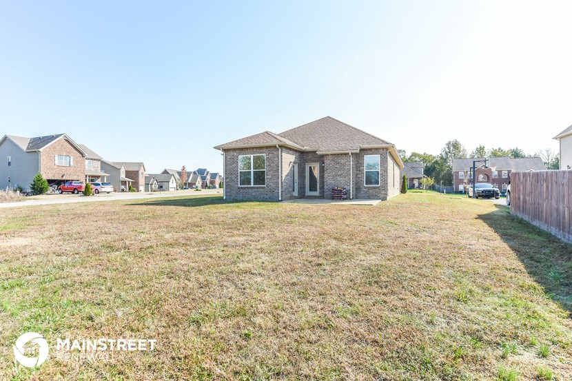 a house with a yard in front of it