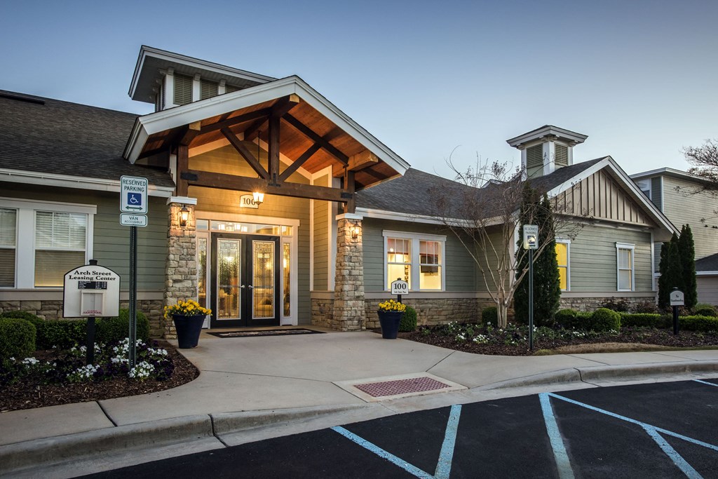 a building with a sidewalk in front of it