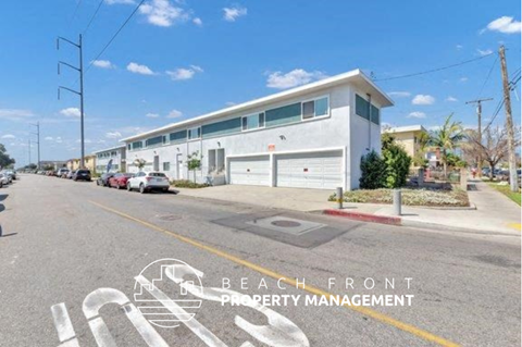 a picture of a building on the side of a street