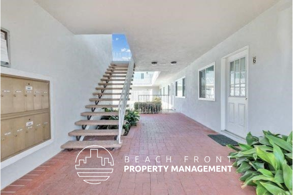 a view of the hallway of a house with a staircase