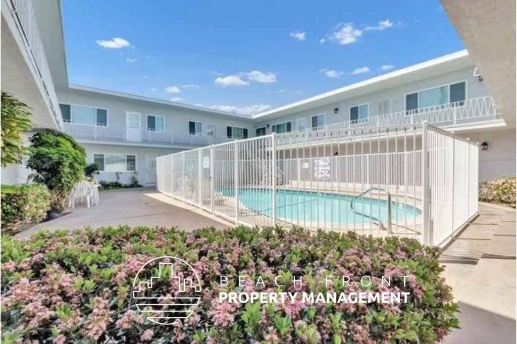 an image of a pool in a building with a balcony