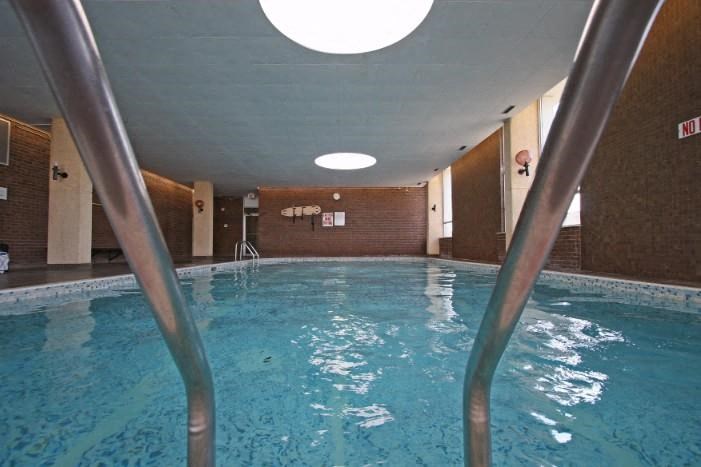 a large pool of water in a room with
