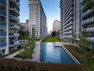 a large pool of water in the middle of a city