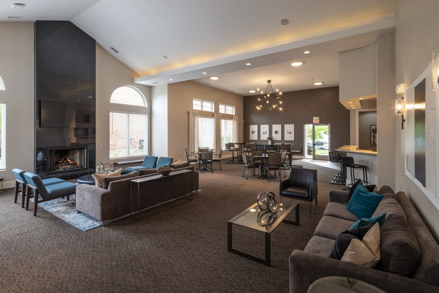 A living room with a fireplace and a couch.