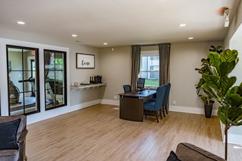 office-2 large office space with furnishings, windows, and wood-style flooring - Photo Gallery 6
