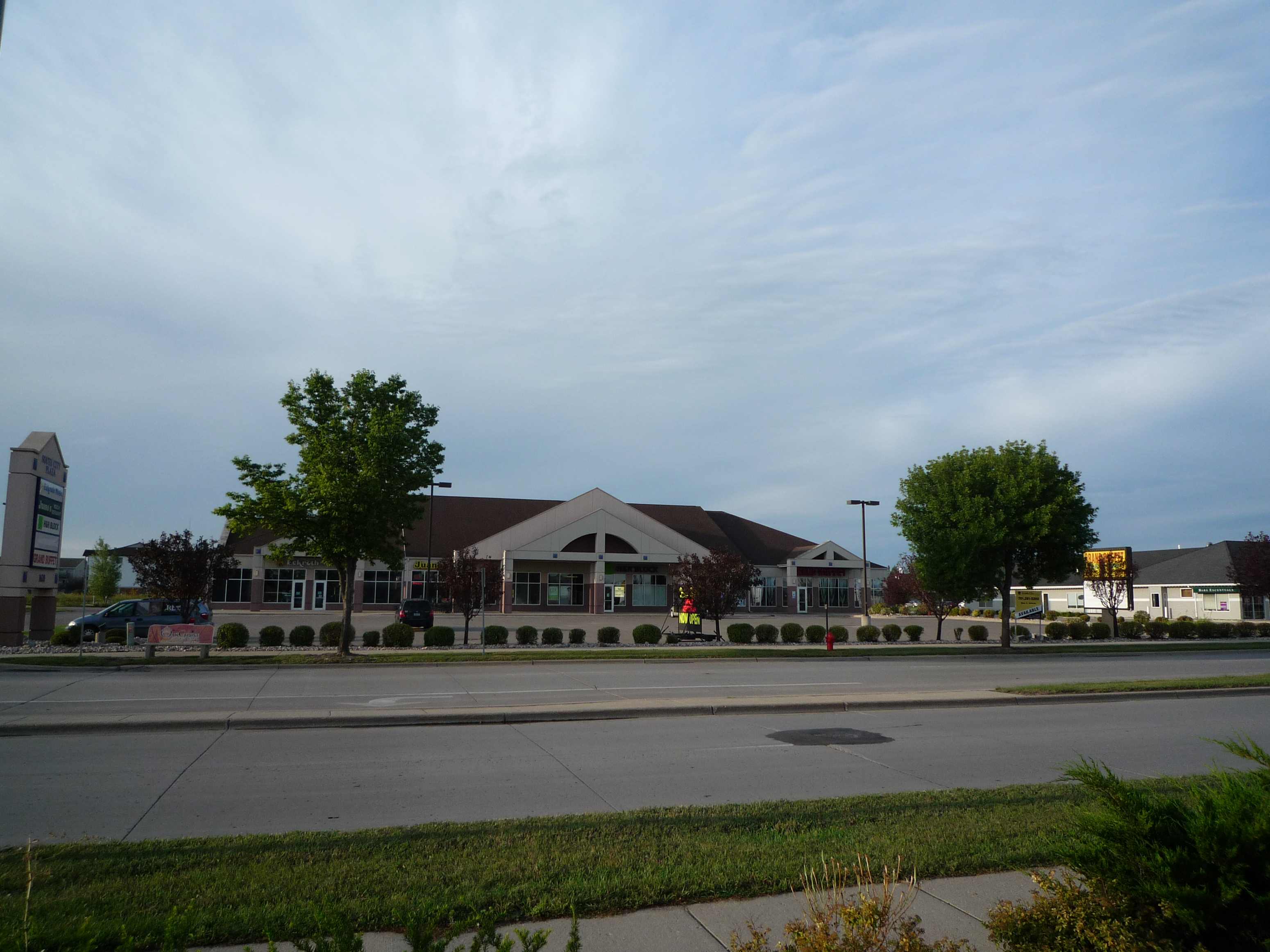 the front of a restaurant on the side of a street
