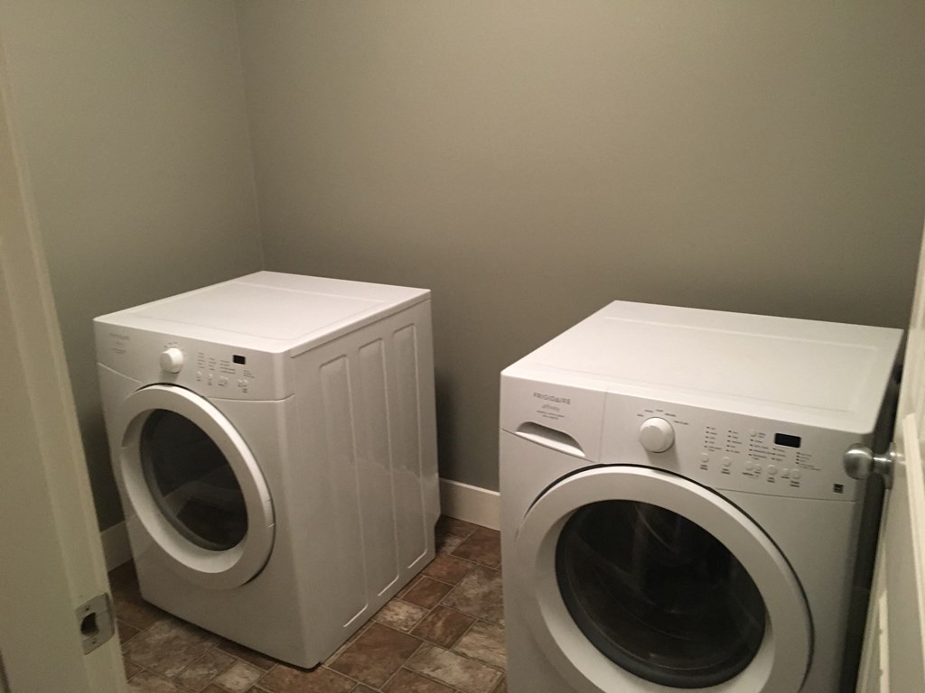 a washer and a dryer in a laundry room