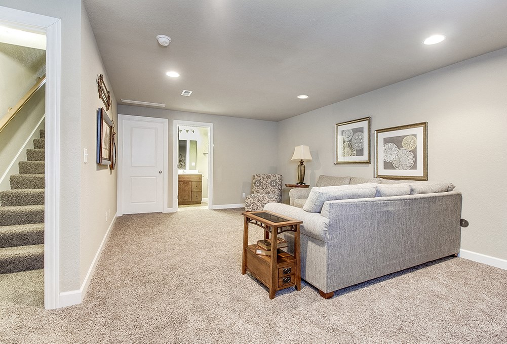 a living room with a couch and a table