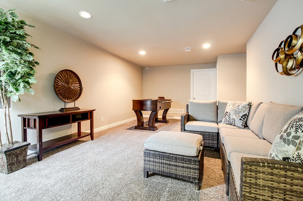 a living room with a couch and a table
