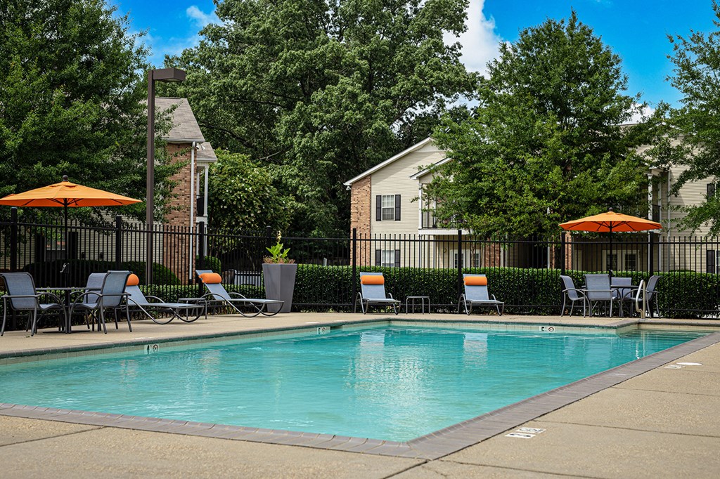 our apartments offer a swimming pool with chairs and umbrellas