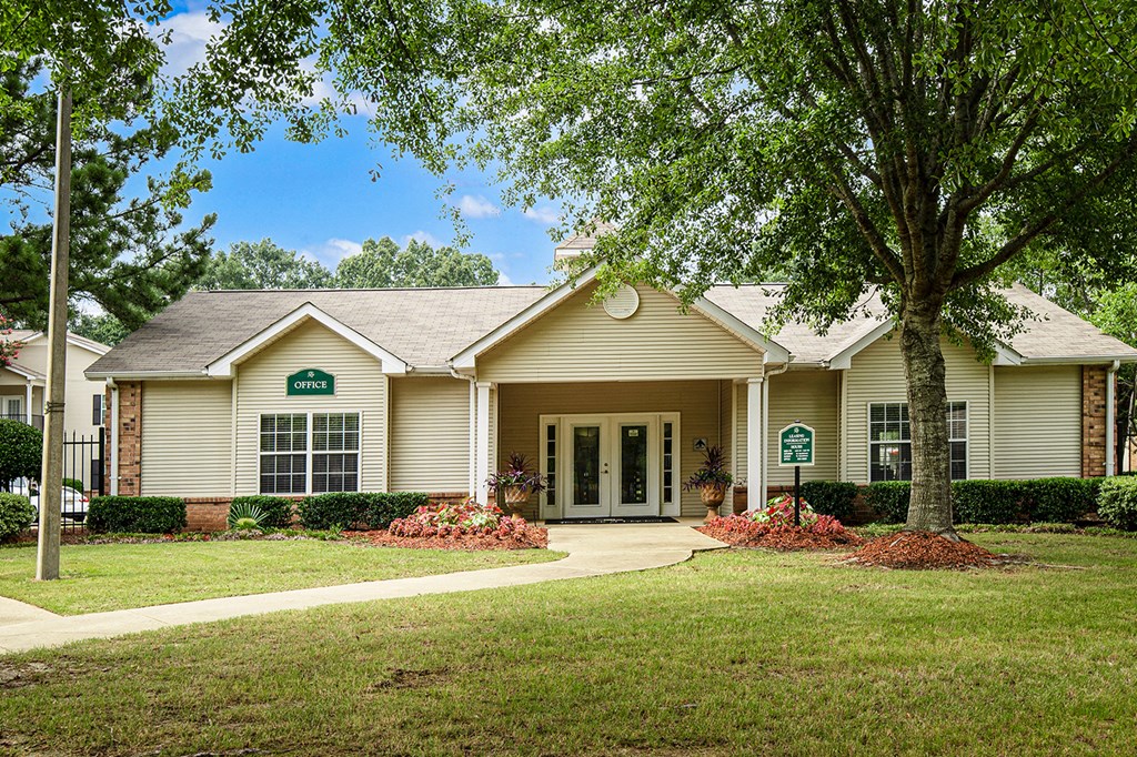a house with a tree in front of it