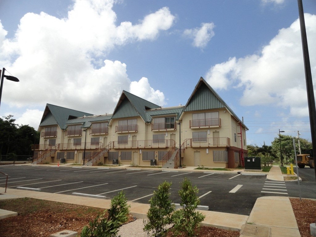 a large building with a street in front of it