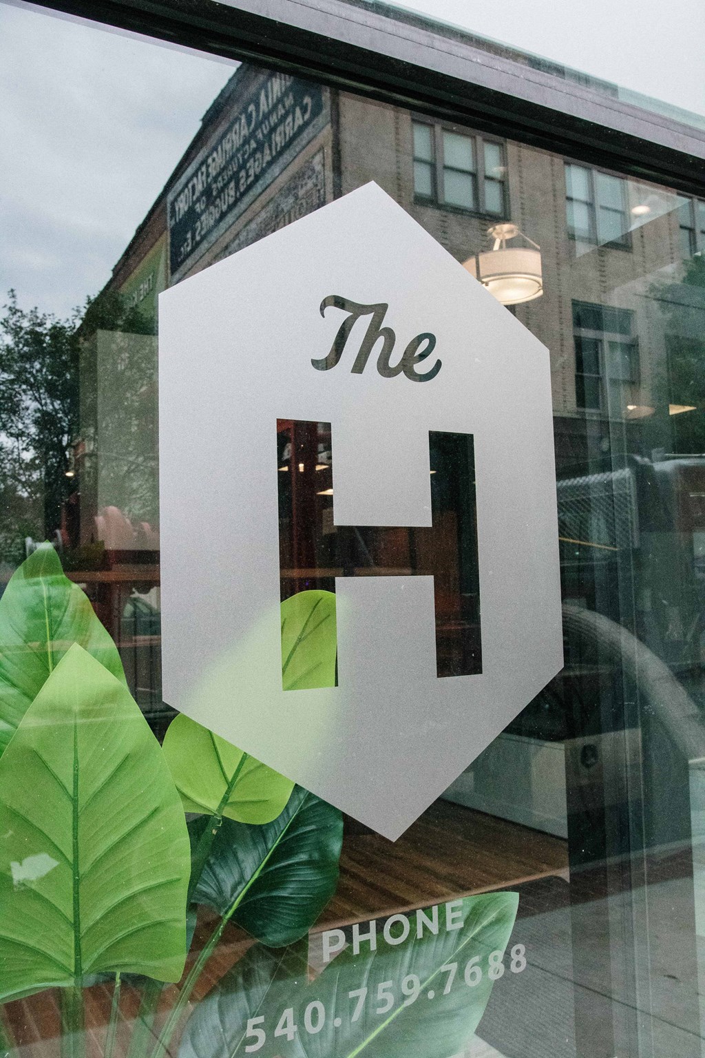 a sign in the window of a restaurant with the number 4