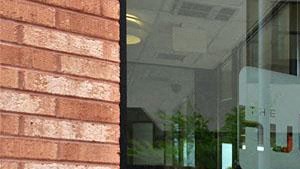 a building with a sign in the front of it