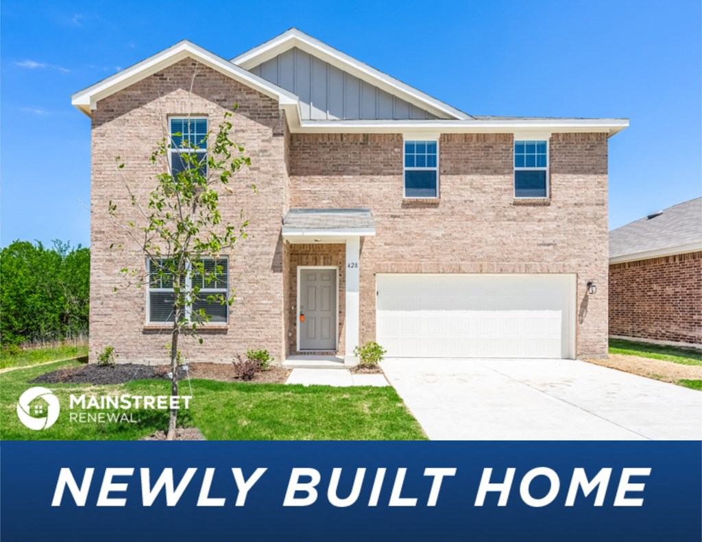 a brick house with the words newly built home
