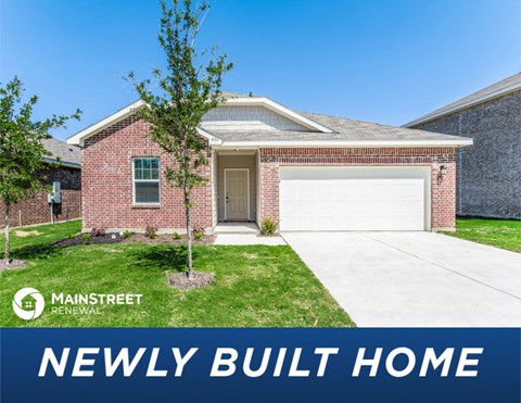a new build home with a garage door