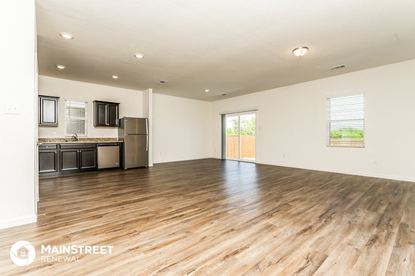 the living room and kitchen are spacious and clean