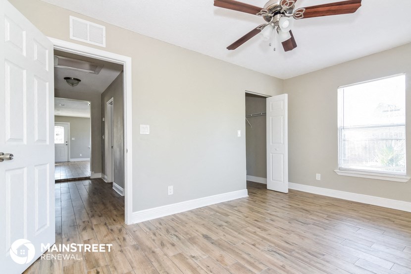 the living room and dining room are open to the hallway