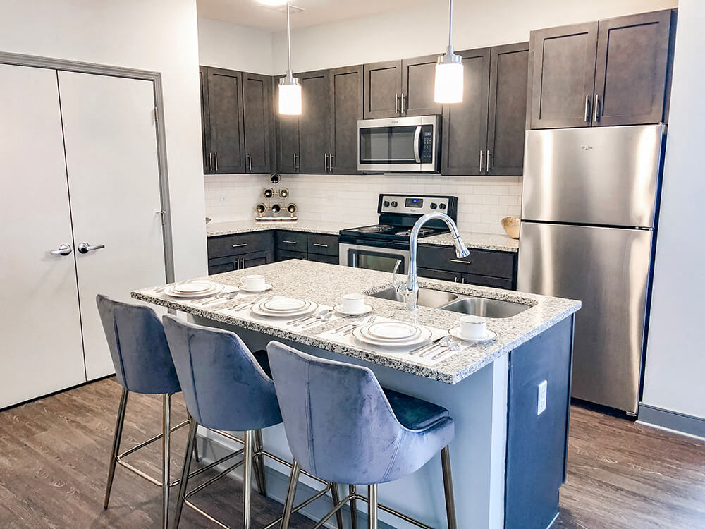 Fitted Kitchen With Island Dining at The Ivy at Berlin Place, South Bend, 46601