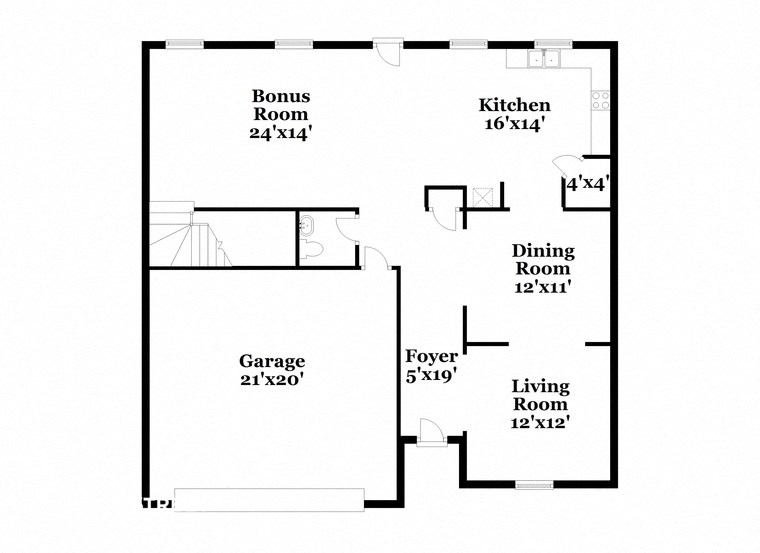 a floor plan of a house with a garage and a kitchen and a dining room