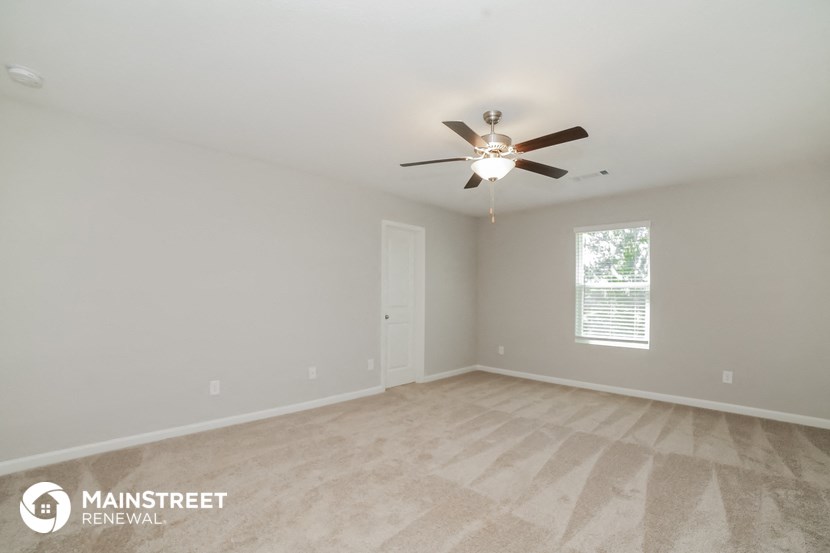 the spacious living room is clean and ready for you to use