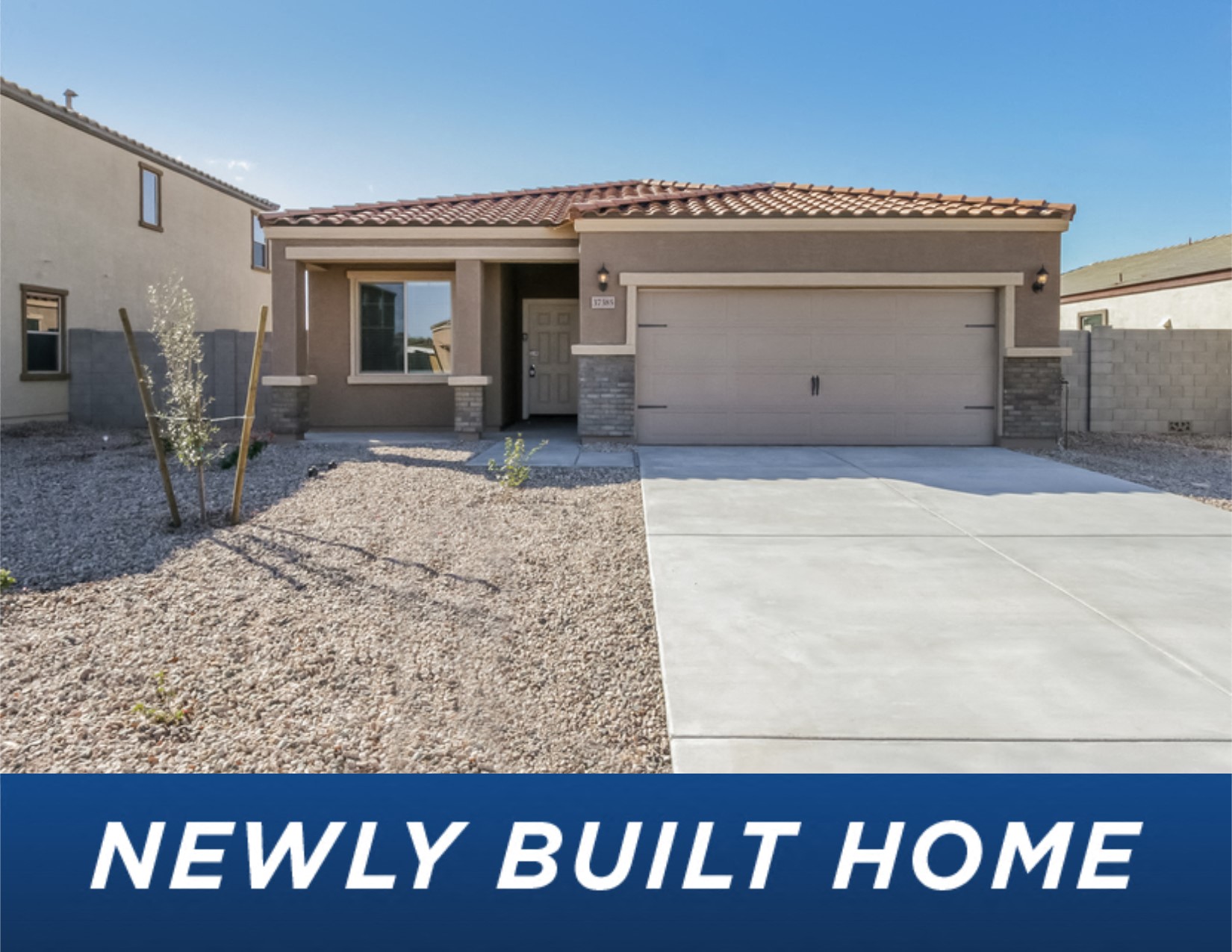 a new build home with a garage door