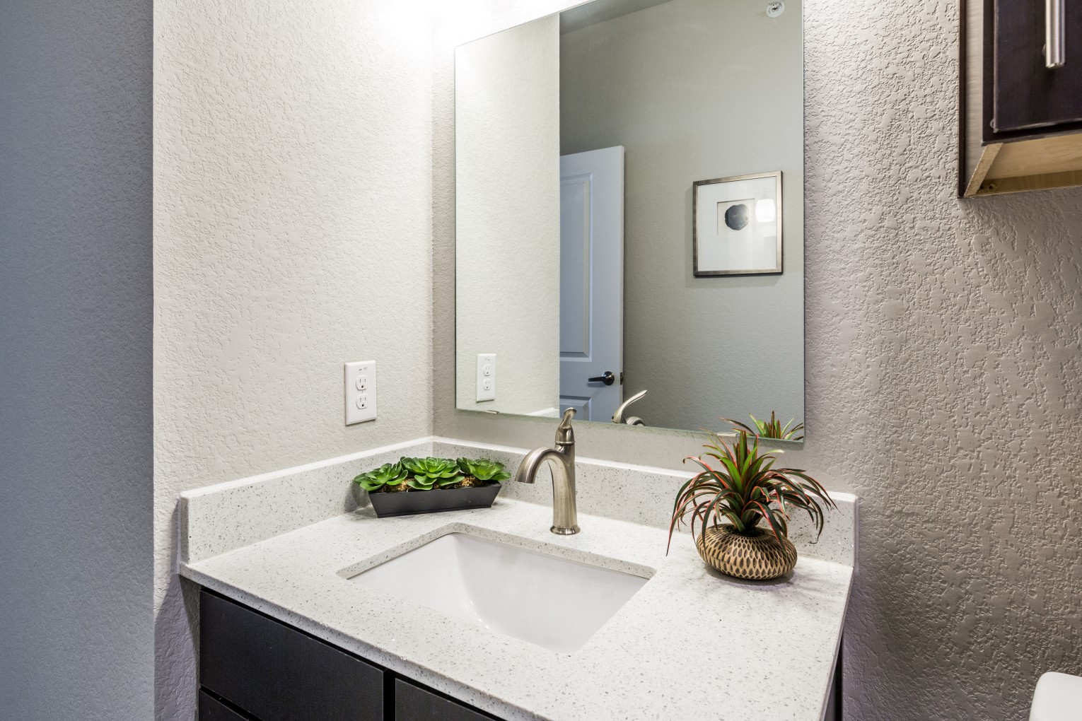 Second bathroom with wood-style flooring and standing tub/shower