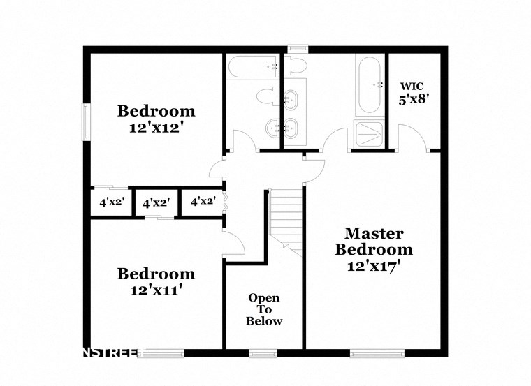 floor plan of the first floor of a house with bedrooms and baths and an open