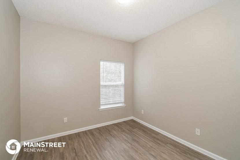 the spacious living room at the willow residence apartments in willow springs tx