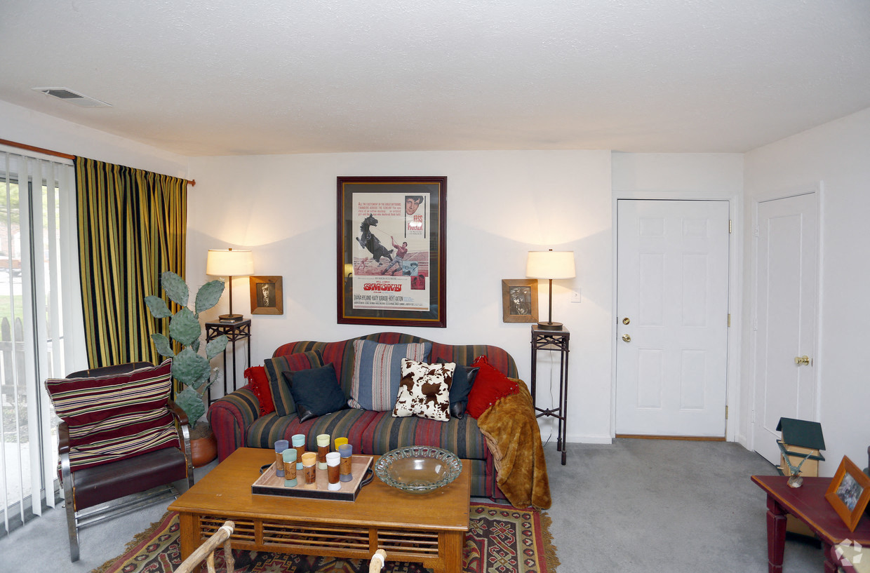 a living room with a couch and a coffee table